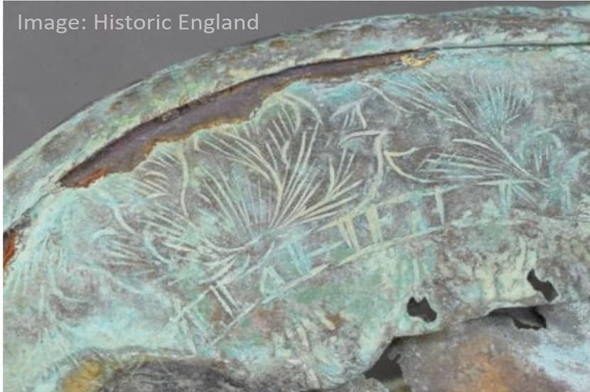 Close up of trumpet bell with decorations