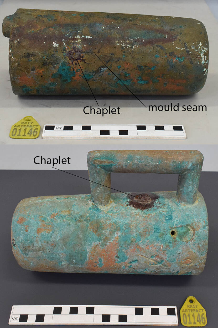 Two breech chambers are depicted above on each other. The top breech chamber is not conserved yet and the bottom breech chamber is conserved. Cast lines and chaplets are pointed out on both breech chambers.
