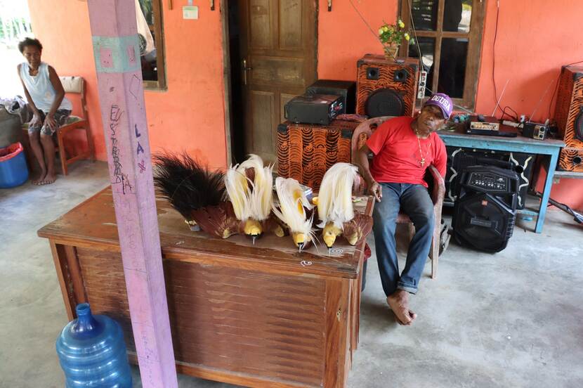 In the Papuan village of Sawyatami, mounted birds of paradise are sold
